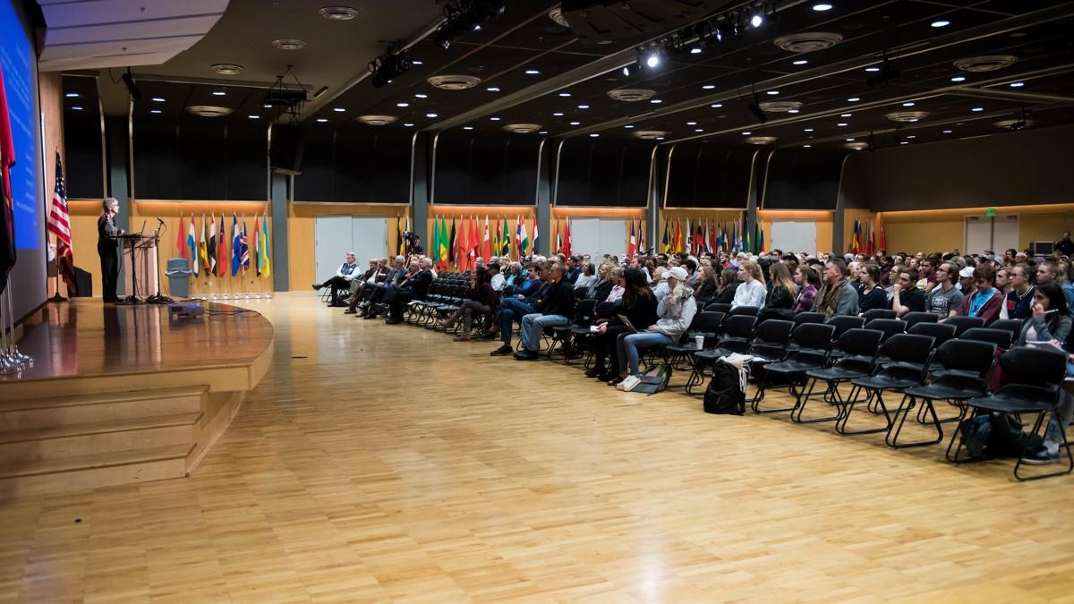 Speaker addresses an audience in the International Ballroom